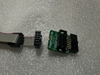 BSL adapter (14 to 10 pins PN: PE014X06 ) and one 10-pins ribbon cable.